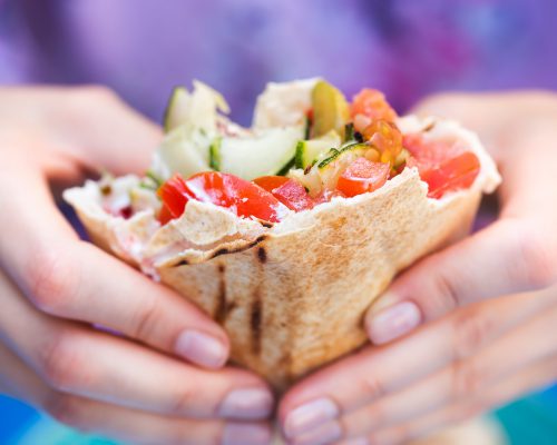 Vegetable wrap with tomatoes, courgettes and sauce