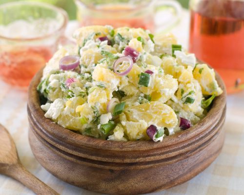 Potato salad with mayonnaise and spring onion, selective focus