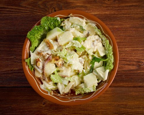 Waldorf salad made of fresh apples, celery and walnuts.farm-style